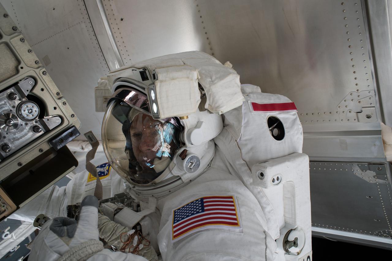 iss055e071501 (May 16, 2018) --- Astronaut Drew Feustel is pictured outside of the International Space Station during a spacewalk on May 16 to swap thermal control gear.