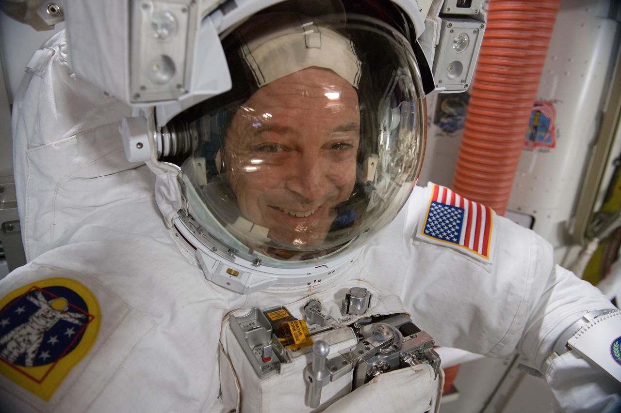 iss055e108820 (May 7, 2018) --- NASA astronaut Ricky Arnold is suited up inside his U.S. spacesuit for a fit check verification ahead of a spacewalk that took place May 16, 2016.