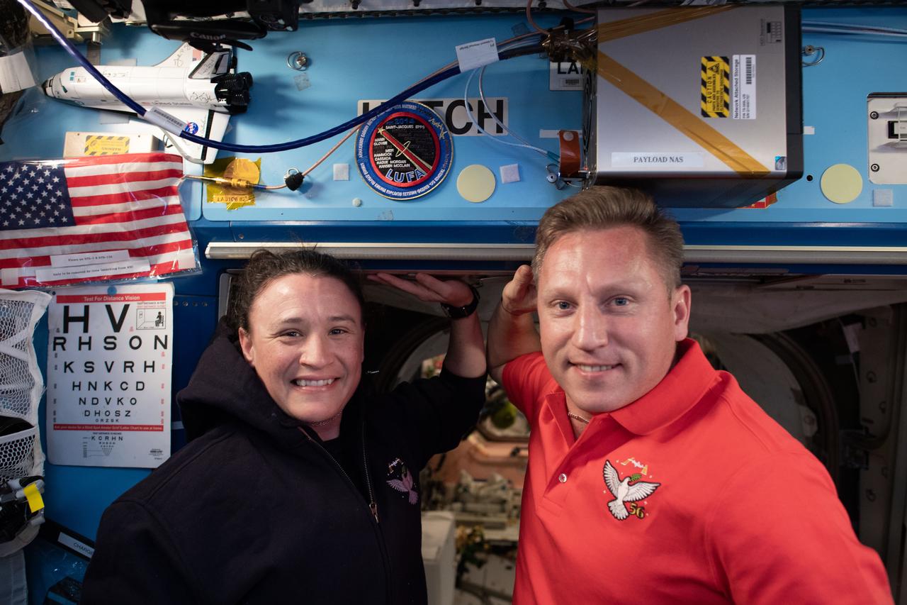 iss056e032441 (June 23, 2018) --- Expedition 56-57 crewmates Serena Auñón-Chancellor of NASA and Sergey Prokopyev of Roscosmos pose for a portrait aboard the International Space Station.