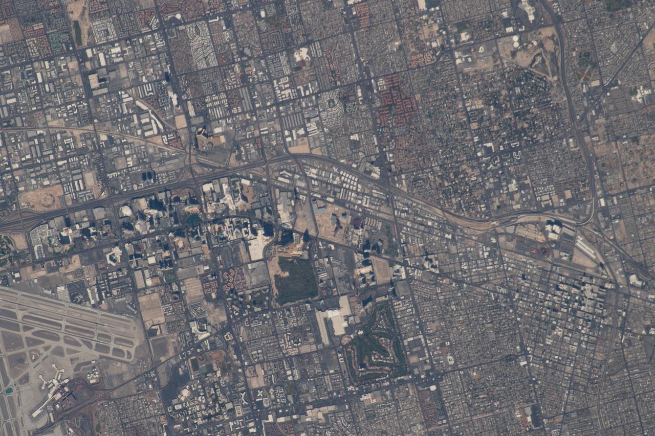 iss056e032756 (June 20, 2018) --- From left to right (true orientation is from south to north along Interstate 15) in this photograph are McCarran International Airport and downtown Las Vegas, Nev.