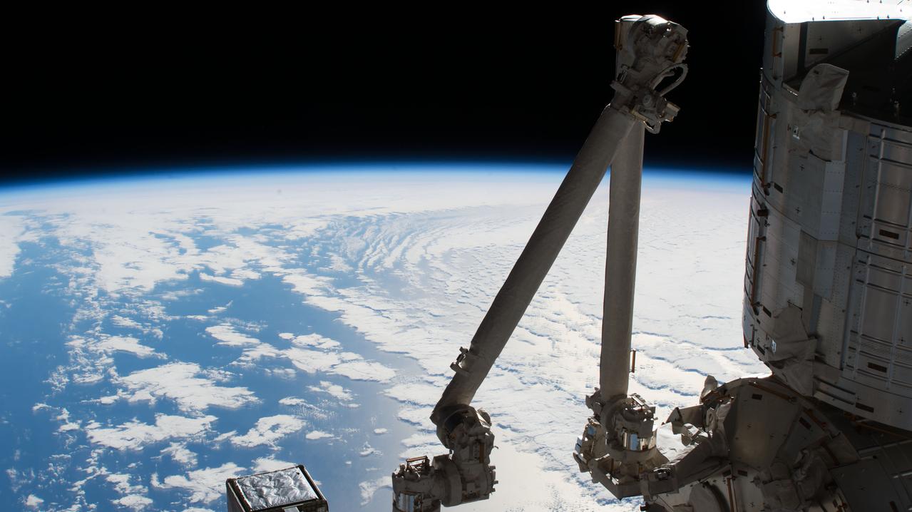 iss056e032832 (June 23, 2018) --- The Earth's limb and the Pacific Ocean contrast segments of the International Space Station's Kibo laboratory module built by the Japan Aerospace Exploration Agency. At right is a portion of the Experiment Logistics Module, Pressurized Section (ELM-PS) which is the Kibo lab's storage facility. Next to the ELM-PS is Kibo's 10-meter-long robotic arm, or Remote Manipulator System, which is attached to the lab module's core component, the Pressurized Module. Kibo was launched in segments to the station on two space shuttle missions in March and May of 2008 and a third shuttle mission in July 2009.