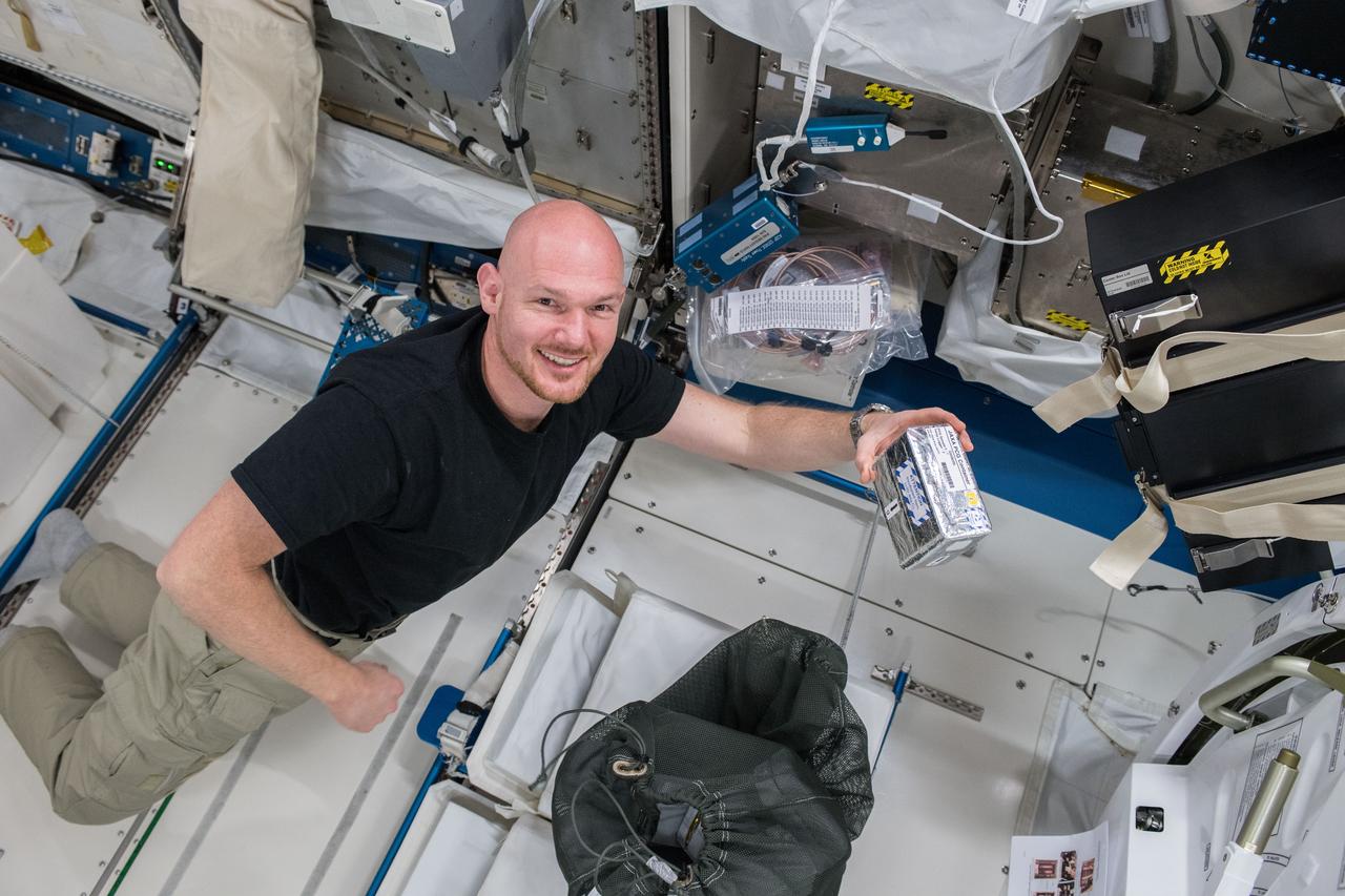 iss056e075928 (7/3/2018) --- Astronaut Alexander Gerst of ESA (European Space Agency), during the JAXA Protein Crystal Growth (PCG) sample retrieval from the Freezer-Refrigerator Of Stirling Cycle 2 (FROST2) and initiation of the crystallization of the samples before inserting them back into the FROST2, where crystallization will continue.