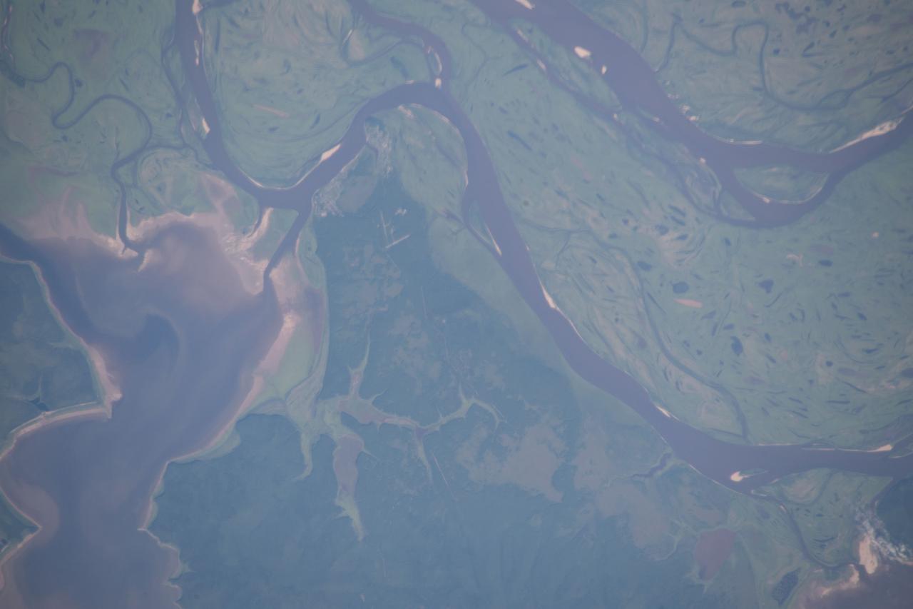 iss056e084388 (July 6, 2018) --- The eastern-flowing Amur River forms a portion of the border between northeastern China and far eastern Russia. At the time of this photograph, the International Space Station was orbiting almost 257 miles above the Strait of Tartary which separates mainland Asia from the Russian island of Sakhalin.