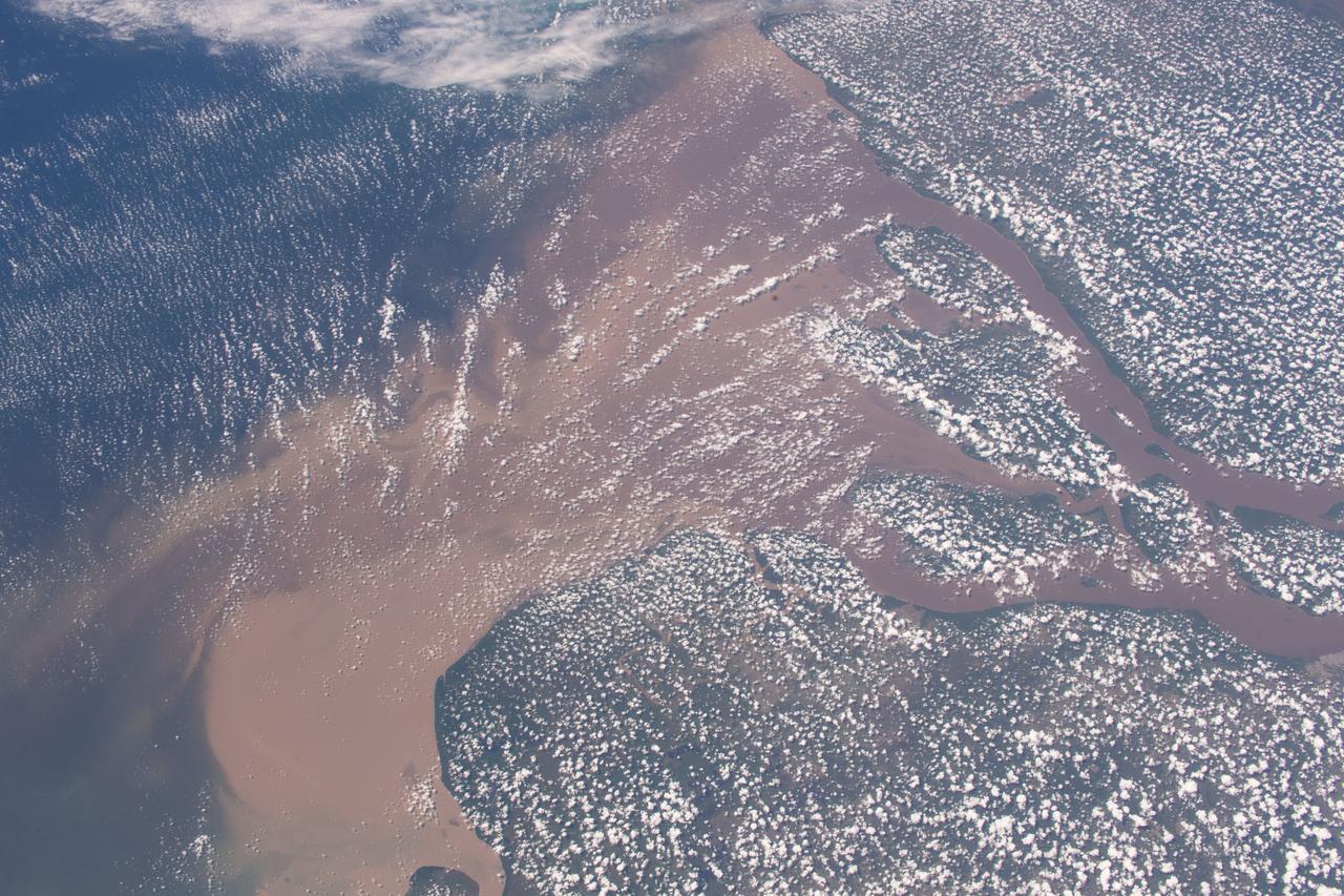 iss056e084566 (July 7, 2018) --- Altocumulus clouds blanket the northeast coast of Brazil where the Amazon River flows into the Atlantic Ocean.