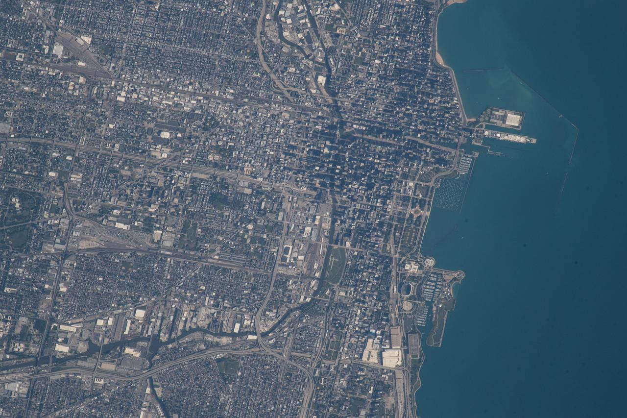 iss056e085102 (July 8, 2018) --- An Expedition 56 crew member photographed downtown Chicago, Illinois as the International Space Station was beginning its orbit over Lake Michigan.