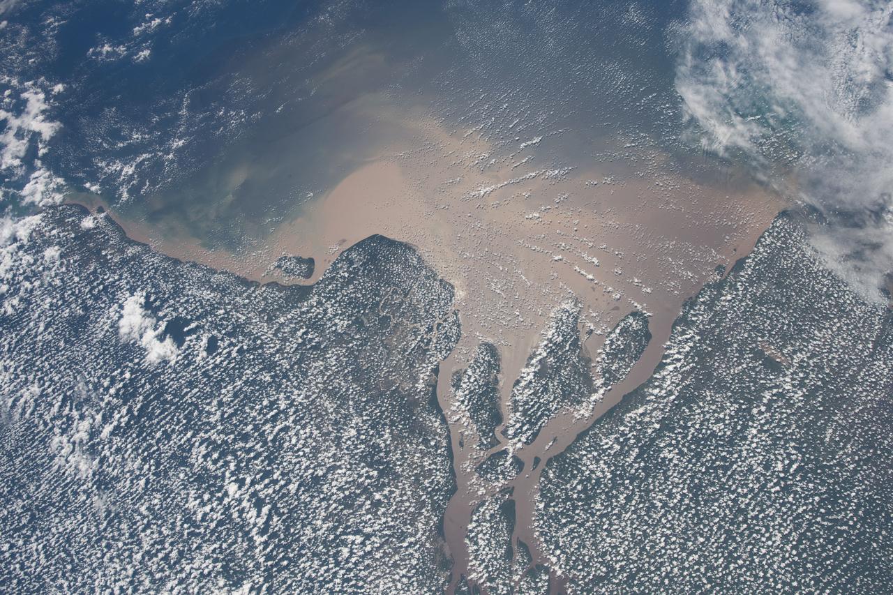 iss056e085377 (July 7, 2018) --- Altocumulus clouds blanket the northeast coast of Brazil where the Amazon River flows into the Atlantic Ocean.