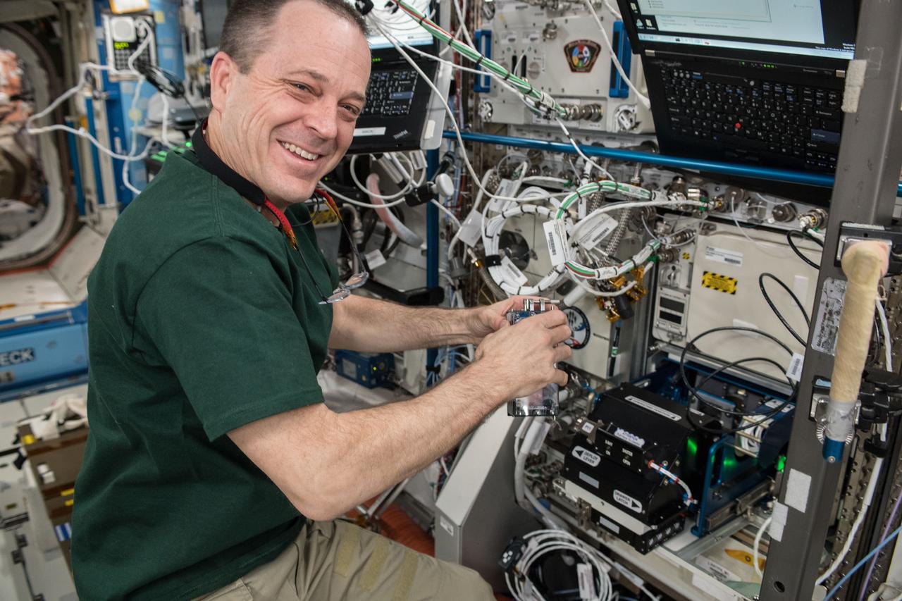 iss056e095029 (July 13, 2018) --- NASA astronaut Ricky Arnold works on gear inside the International Space Station.