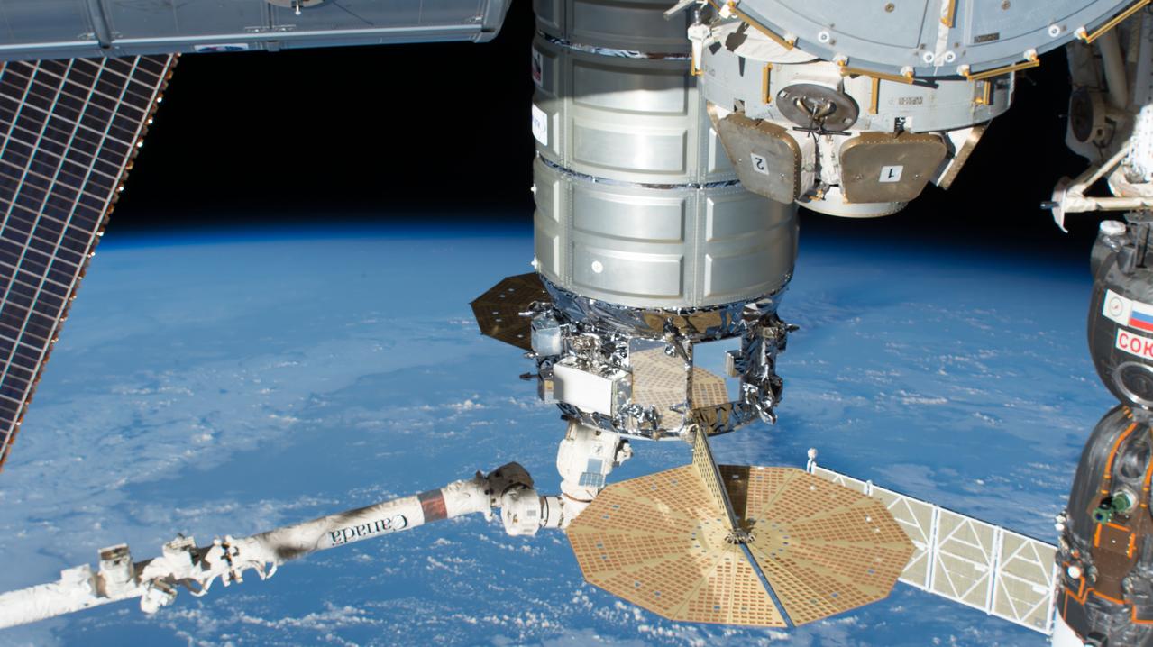 iss056e096470 (July 15, 2018) --- The Cygnus space freighter from Northrop Grumman, formerly Orbital ATK, is grappled by the Canadarm2 robotic arm while still attached to the Harmony module. Cygnus would soon be uninstalled from Harmony and released back into Earth orbit ending a 52-day cargo mission at the International Space Station.