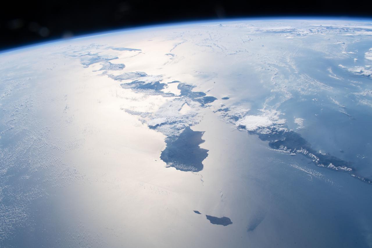 iss056e098152 (July 23, 2018) --- Just a few of the thousands of volcanic islands that make up the nation of Indonesia are pictured as the International begins an orbital pass over the Timor Sea after crossing western Australia.