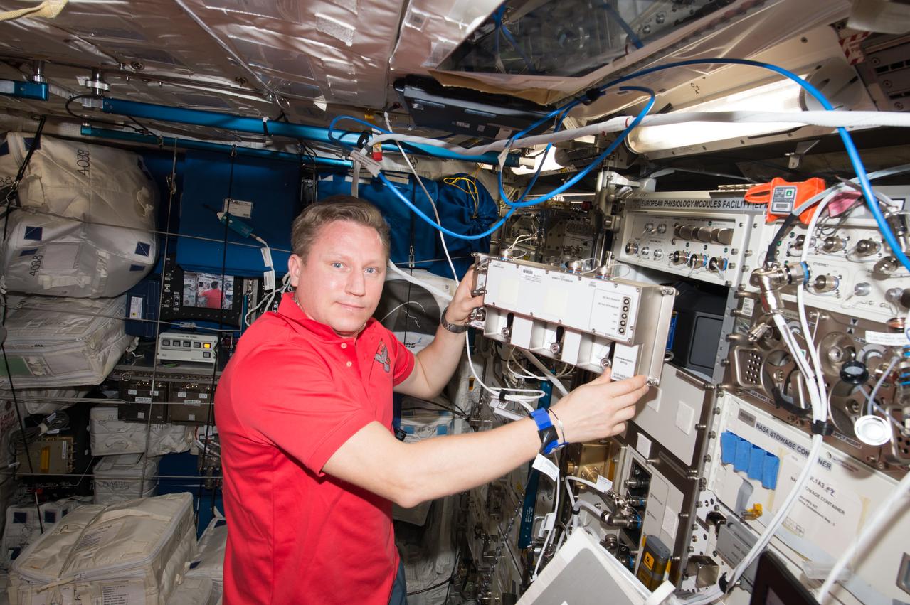 iss056e098196 (July 23, 2018) --- Expedition 56 Flight Engineer Sergey Prokopyev, from Roscosmos, works with Plasma Kristall-4 (PK-4) science hardware inside the International Space Station's Columbus laboratory module from ESA (European Space Agency). The space physics study is investigating complex plasmas consisting of low temperature gaseous mixtures composed of ionized gas, neutral gas, and micron-sized particles. The results could benefit future spacecraft design and impact industries on Earth.