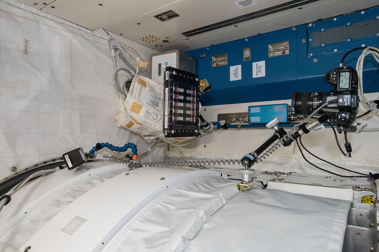 iss056e098988 (July 26, 2018) --- Photographic documentation of the Binary Colloidal Alloy Test-Cohesive Sedimentation investigation (BCAT-CS). The fluid physics research explores the sedimentary properties of quartz and clay particles. Mixed quartz and clay samples are suspended in a liquid for photographic and video downlink to scientists on Earth helping guide future geological studies of unexplored planets and improving petroleum exploration here on Earth.