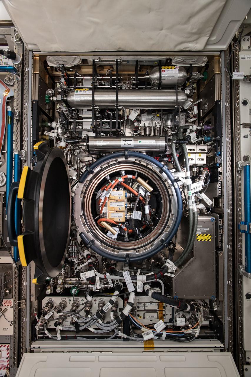iss056e130654 (Aug. 10, 2018) --- The Combustion Integration Rack (CIR), pictured in its open configuration, is located in the U.S. Destiny laboratory module and includes an optics bench, combustion chamber, fuel and oxidizer control, and five different cameras for performing combustion experiments safely in microgravity.
