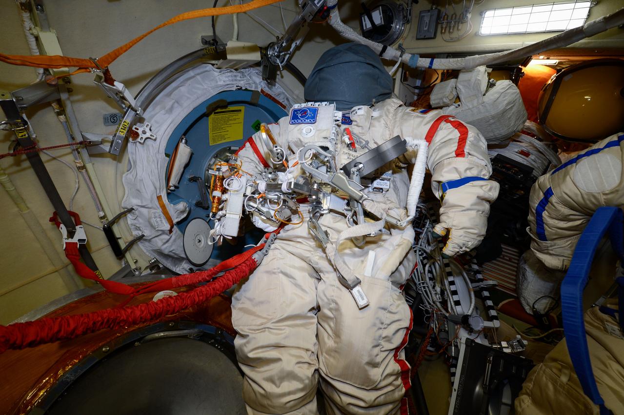 iss056e131016 (Aug. 10, 2018) --- A Russian Orlan spacesuit is pictured inside the Pirs airlock ahead of a planned Aug. 15 Russian spacewalk with cosmonauts Oleg Artemyev and Sergey Prokopyev. The Pirs airlock is where Russian spacewalks are staged.