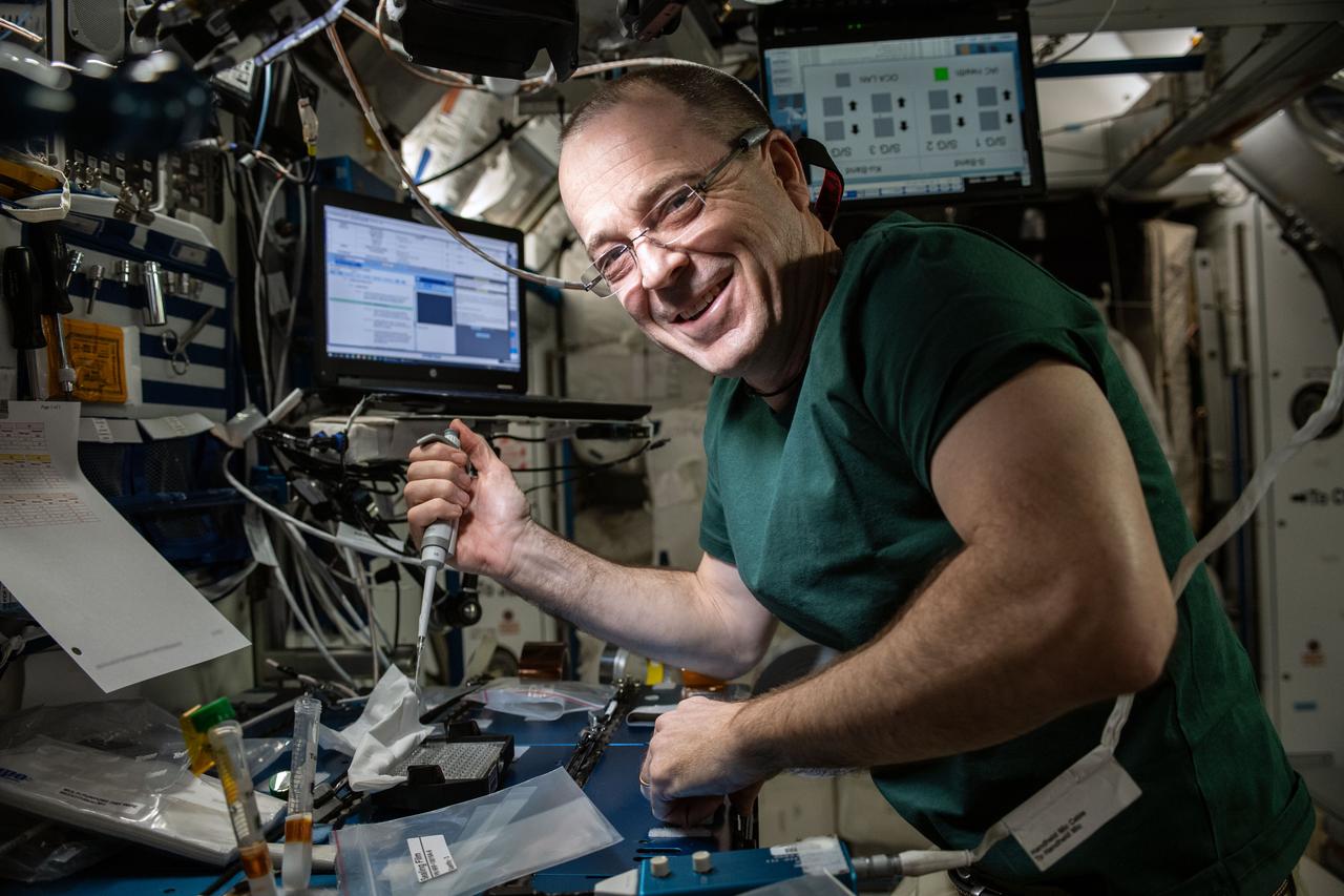 iss056e142865_alt (8/13/2018) --- Astronaut Ricky Arnold prepares samples for the Barrios Protein Crystal Growth (Barrios PCG) experiment in the Maintenance Work Area (MWA) of the International Space Station (ISS). The Barrios PCG experiment defined an approach for optimizing protein crystallization conditions on orbit, eliminating the need to return samples to the ground during the optimization phase, which has the potential for saving substantial time and money on future PCG investigations in microgravity.