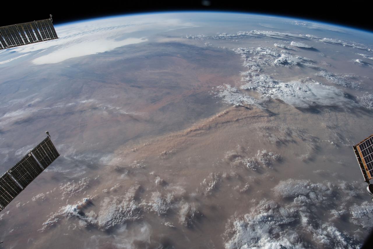 iss056e151163 (Aug. 18, 2018) --- Earth's limb and dust storms in the Sahara are pictured as the International Space Station orbited nearly 252 miles above the African country of Mali.