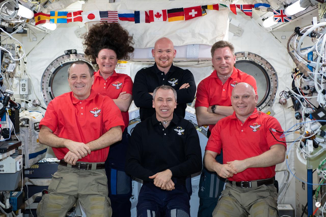 iss056e157041 (Aug. 25, 2018) --- The Expedition 56 crew members pose for a portrait in the International Space Station's Kibo laboratory module. Top row, from left, are Flight Engineers Serena Auñón-Chancellor, Alexander Gerst and Sergey Prokopyev. Bottom row, from left, are Flight Engineer Ricky Arnold, Commander Drew Feustel and Oleg Artemyev. Auñón-Chancellor, Arnold and Feustel represent NASA while Artemyev and Prokopyev represent Roscosmos. Gerst of ESA (European Space Agency) will become commander of Expedition 57 when Feustel, Arnold and Artemyev depart the space station in October.