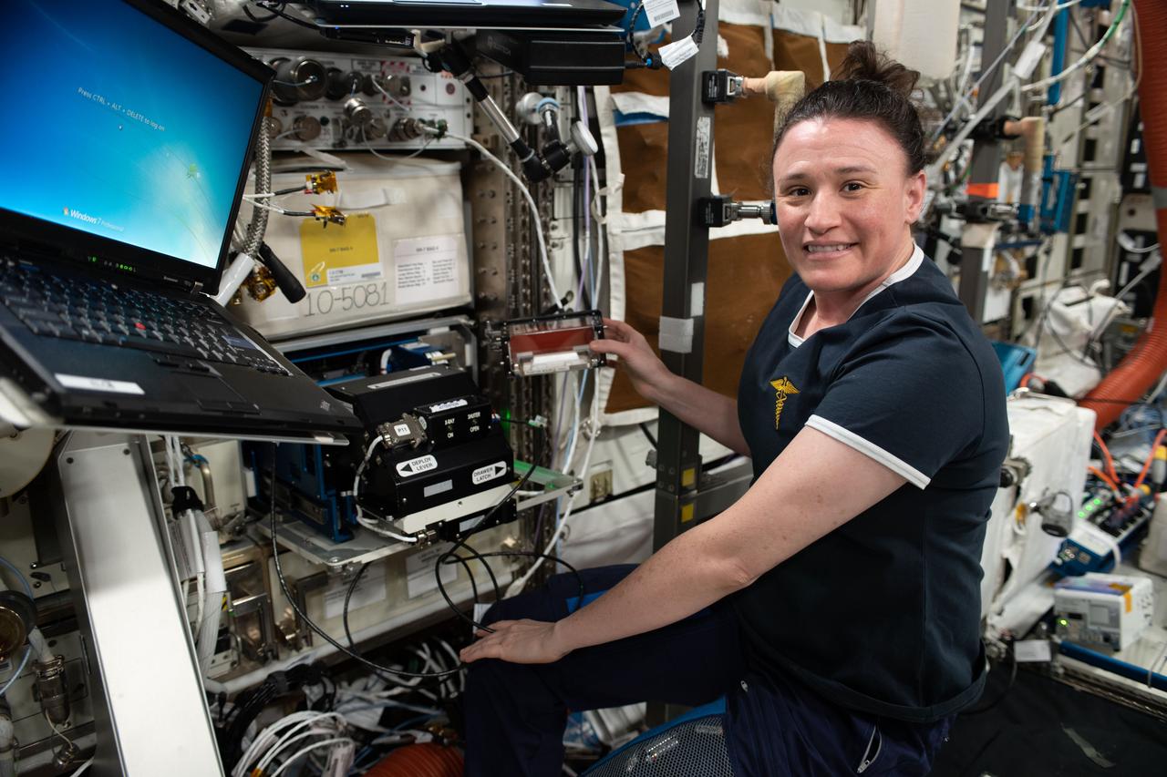 iss056e158493 (Aug. 27, 2018) --- NASA astronaut Serena Auñón-Chancellor works to calibrate a Bone Densitometer aboard the International Space Station's U.S. Destiny laboratory. The device measures the mass per unit volume (density) of minerals in bone using using Dual-Energy X-ray Absorptiometry (DEXA). It is being developed from commercial off-the-shelf hardware and is being designed to fit into an EXPRESS Rack locker. The Bone Densitometer takes quantitative measures of bone loss in mice, during orbital space flight, which are necessary for the development of countermeasures for human crew members, as well as for bone-loss syndromes on Earth, by commercial entities. Planned studies, both academic and commercial, require on-orbit analytical methods including bone densitometry.