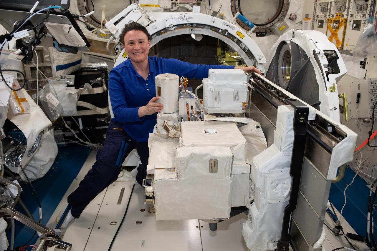 iss056e161171 (Sept. 6, 2018) --- NASA astronaut Serena Auñón-Chancellor works inside Japan's Kibo laboratory module replacing a high definition television camera unit on an exposed facility unit adapter. The gear was placed on Kibo's airlock slide table and later placed on the outside of the International Space Station.
