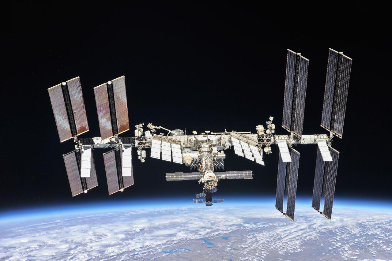 iss056e201225 (Oct. 4, 2018) --- The International Space Station photographed by Expedition 56 crew members from a Soyuz spacecraft after undocking. NASA astronauts Andrew Feustel and Ricky Arnold and Roscosmos cosmonaut Oleg Artemyev executed a fly around of the orbiting laboratory to take pictures of the station before returning home after spending 197 days in space. The station will celebrate the 20th anniversary of the launch of the first element Zarya in November 2018. Credit: NASA/Roscosmos