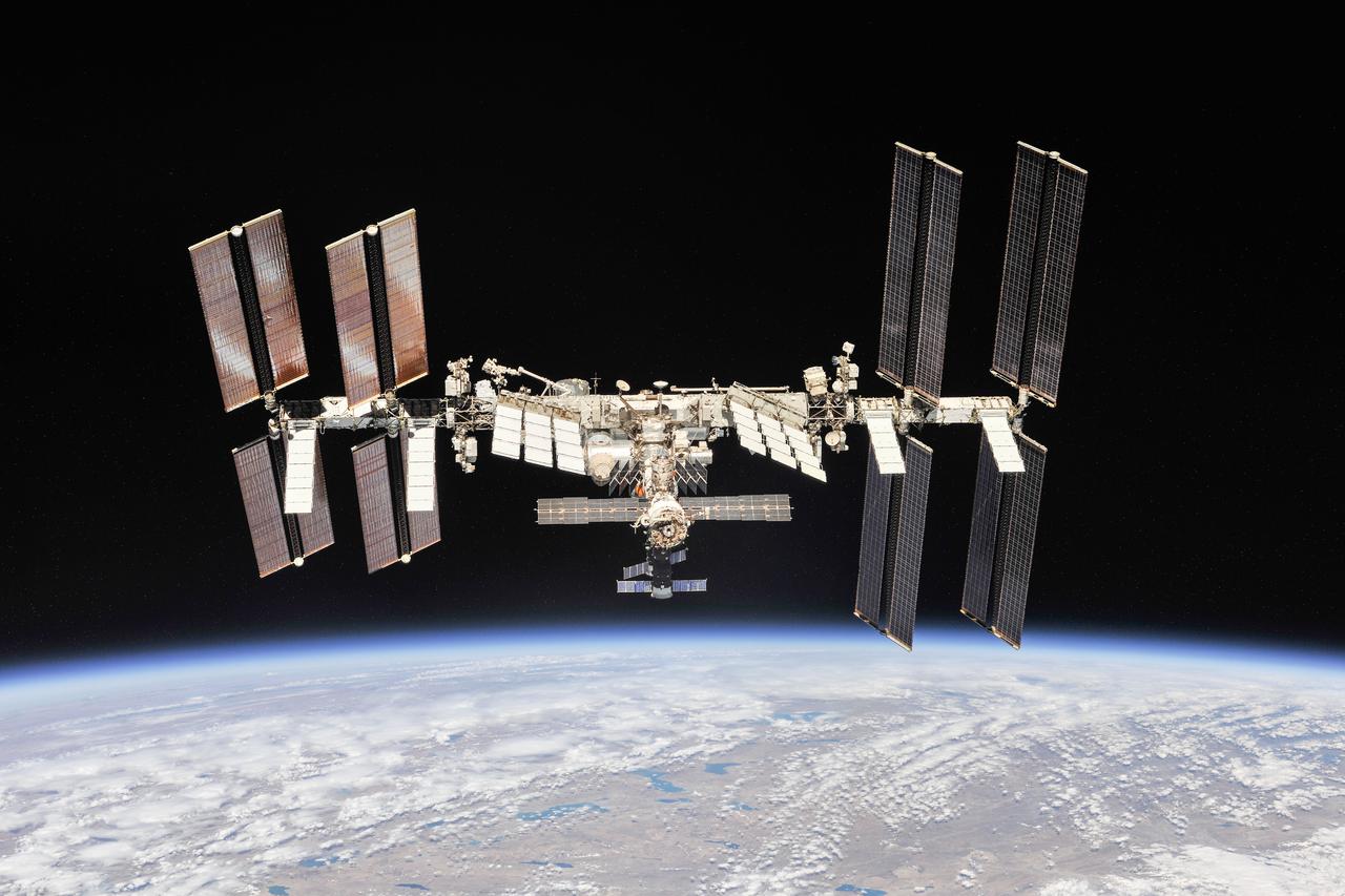 iss056e201235 (Oct. 4, 2018) --- The International Space Station photographed by Expedition 56 crew members from a Soyuz spacecraft after undocking. NASA astronauts Andrew Feustel and Ricky Arnold and Roscosmos cosmonaut Oleg Artemyev executed a fly around of the orbiting laboratory to take pictures of the station before returning home after spending 197 days in space. The station will celebrate the 20th anniversary of the launch of the first element Zarya in November 2018. Credit: NASA/Roscosmos
