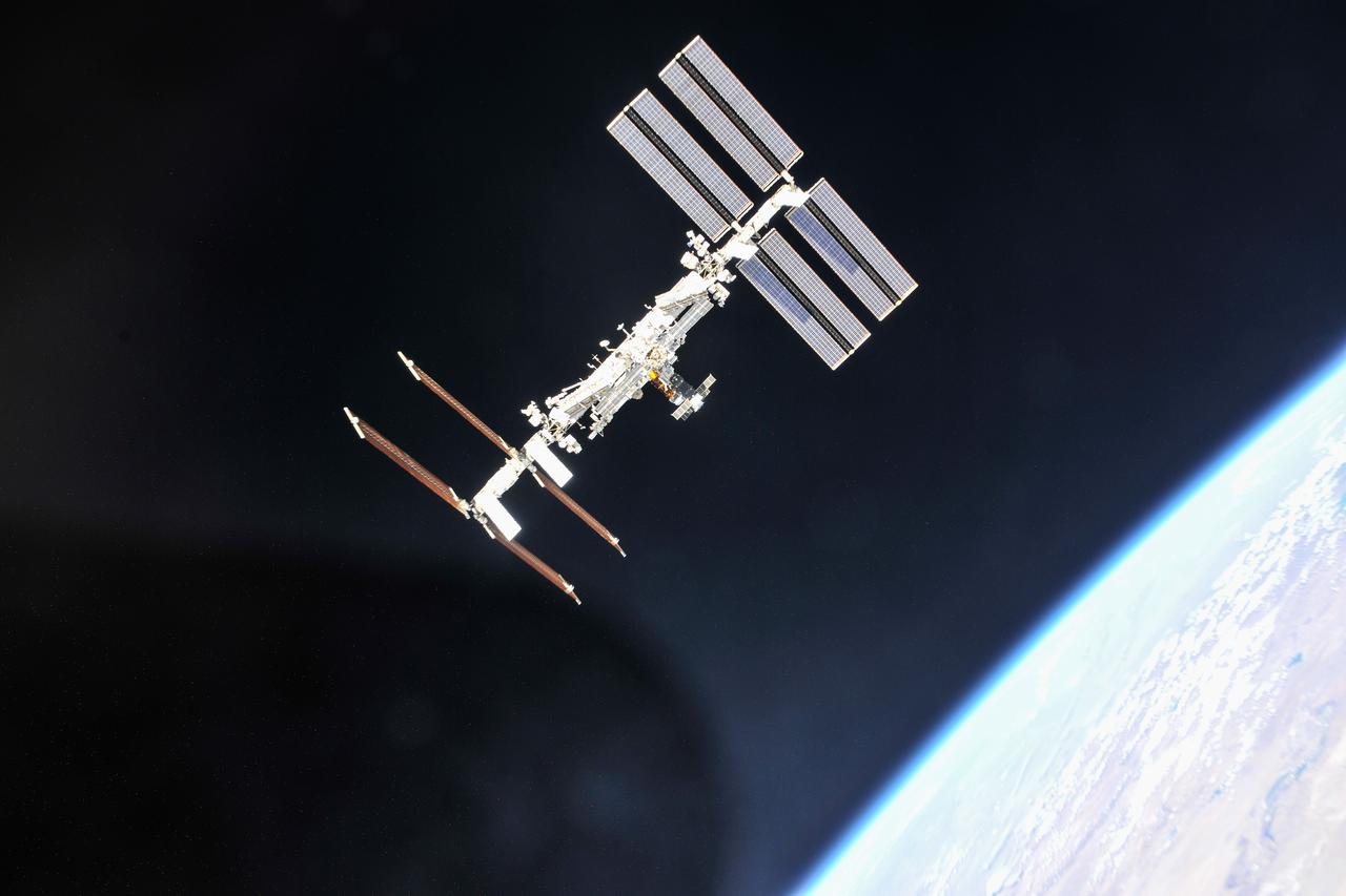 iss056e201302 (Oct. 4, 2018) --- The International Space Station photographed by Expedition 56 crew members from a Soyuz spacecraft after undocking. NASA astronauts Andrew Feustel and Ricky Arnold and Roscosmos cosmonaut Oleg Artemyev executed a fly around of the orbiting laboratory to take pictures of the station before returning home after spending 197 days in space. The station will celebrate the 20th anniversary of the launch of the first element Zarya in November 2018. Credit: NASA/Roscosmos