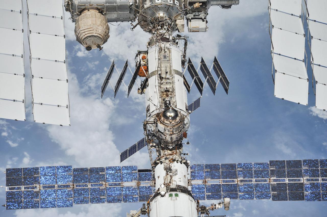 iss056e201382 (Oct. 4, 2018) --- The International Space Station photographed by Expedition 56 crew members from a Soyuz spacecraft after undocking. NASA astronauts Andrew Feustel and Ricky Arnold and Roscosmos cosmonaut Oleg Artemyev executed a fly around of the orbiting laboratory to take pictures of the station before returning home after spending 197 days in space. The station will celebrate the 20th anniversary of the launch of the first element Zarya in November 2018. Credit: NASA/Roscosmos