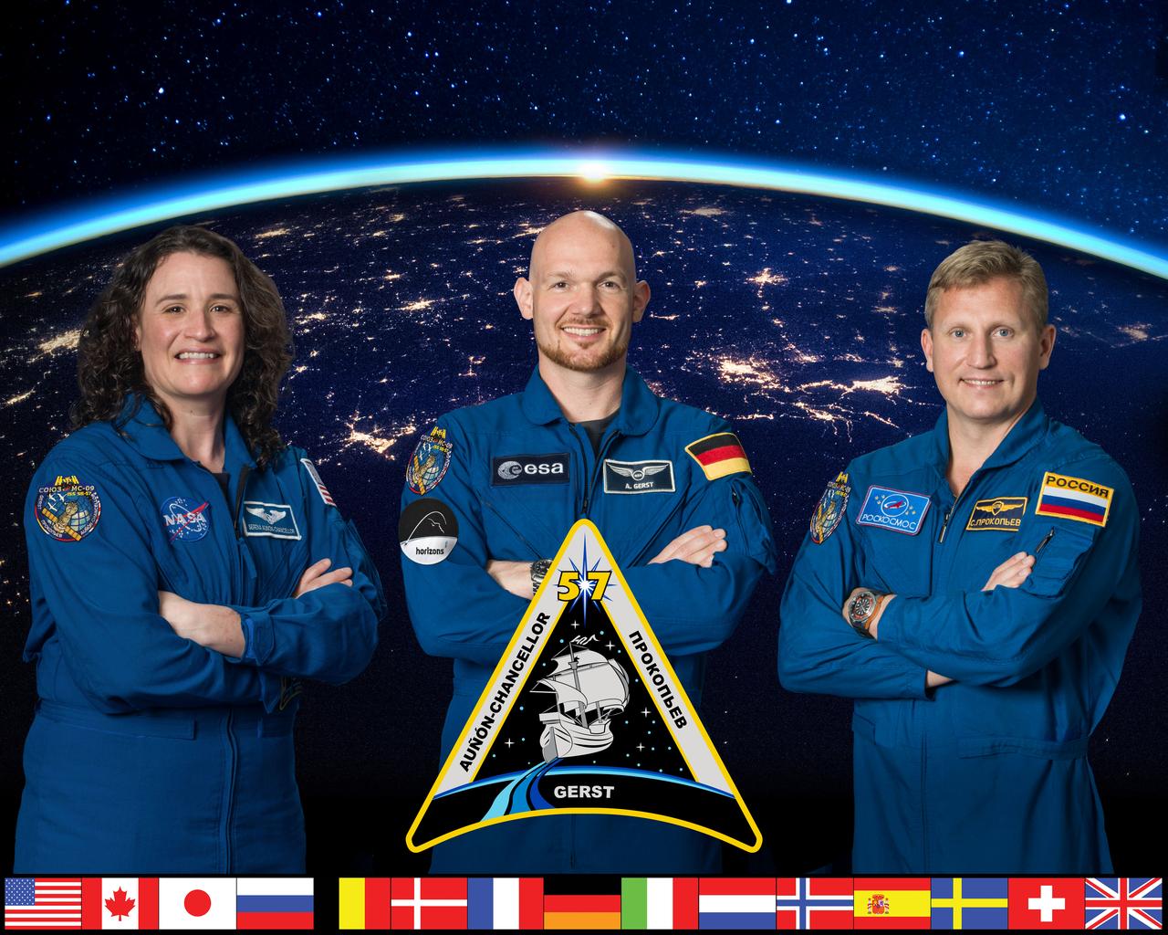 iss057-s-002b (Nov. 8, 2017) --- Official crew portrait of Expedition 57 crew members (from left) Serena Auñón-Chancellor of NASA, Alexander Gerst of ESA (European Space Agency) and Sergey Prokopyev of Roscosmos.