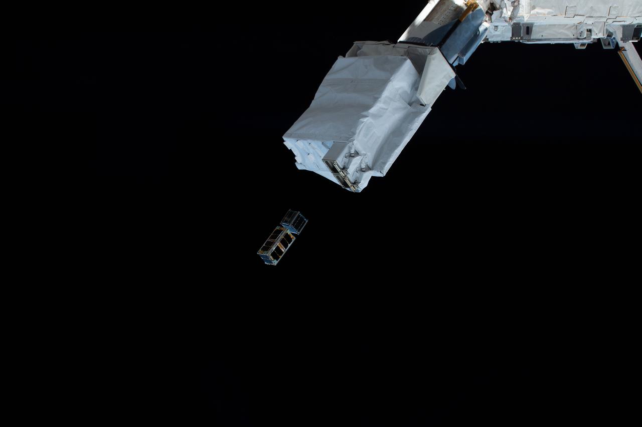 iss057e006046 (10/6/2018) --- Documentation of two Japan Aerospace Exploration Agency (JAXA) CubeSats, STARS-Me and RSP-00, deployed from JEM [Japanese Experiment Module]-Small Satellite Orbital Deployer 10 (J-SSOD 10) equipment on the Multi-Purpose Experiment Platform (MPEP).
