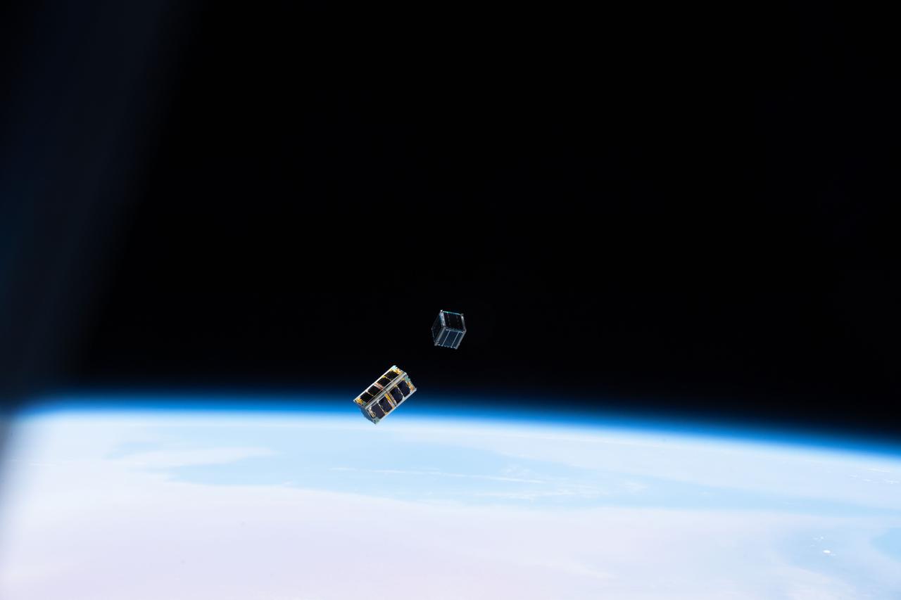 iss057e006069 (10/6/2018) --- Documentation of two deployed Japan Aerospace Exploration Agency (JAXA) CubeSats, STARS-Me and RSP-00, during the JEM [Japanese Experiment Module]-Small Satellite Orbital Deployer 10 (J-SSOD 10) mission. Earth is in the background.