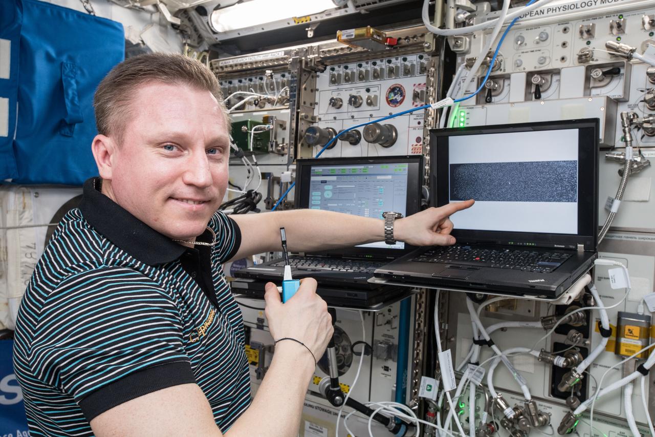 iss057e074494 (Nov. 7, 2018) --- Russian cosmonaut and Expedition 57 Flight Engineer Sergey Prokopyev is pictured inside Europe's Columbus lab module conducting research for the Plasma Krystall-4 experiment that researches how microgravity, electric fields and the Sun impact complex plasmas which are low temperature gaseous mixtures composed of ionized gas, neutral gas, and micron-sized particles..