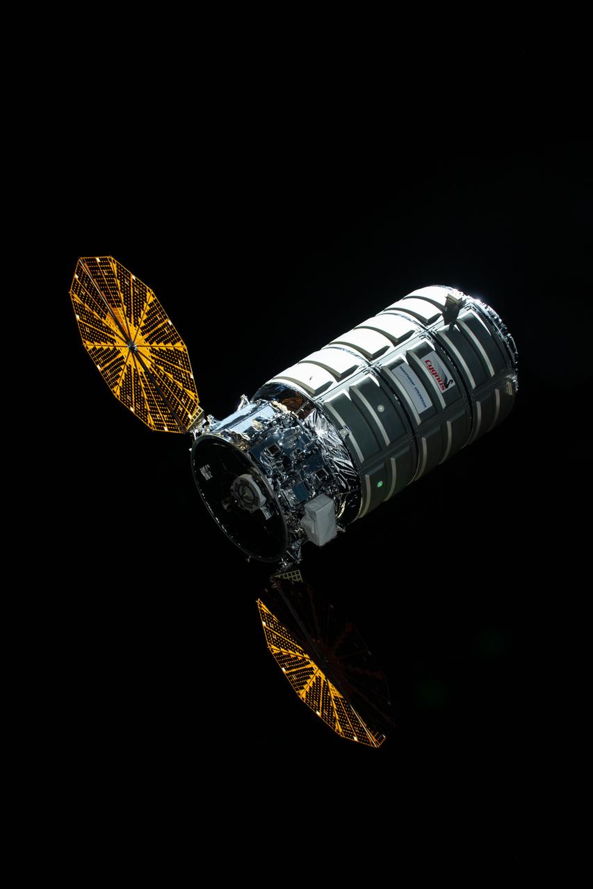 iss057e102365 (Nov. 19, 2018) --- Northrop Grumman's Cygnus space freighter with its prominent cymbal-shaped UltraFlex solar arrays slowly approaches the International Space Station before it's capture with the Canadarm2 robotic arm operated by Expedition 57 Flight Engineer Serena Auñón-Chancellor and ESA (European Space Agency) astronaut Alexander Gerst.