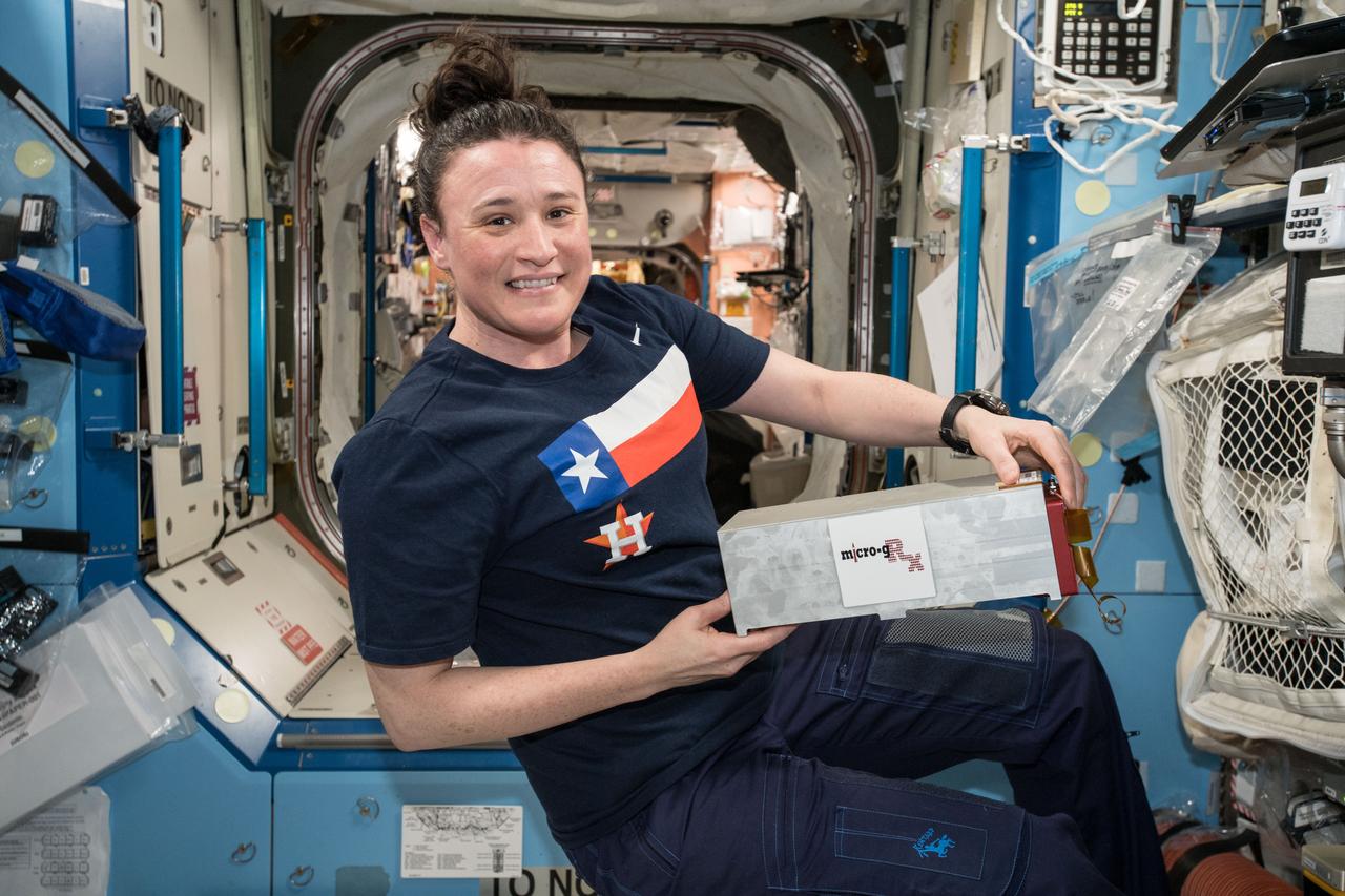 iss057e105708 (11/24/2018) --- A view of NASA astronaut Serena Auñón-Chancellor holding the Microg-Rx CubeLab. The Culturing of Human Myocytes in Microgravity: An In Vitro Model to Evaluate Therapeutics to Counteract Muscle Wasting (Culturing of Human Myocytes in Microgravity) experiment aims to better understand muscle growth and repair in microgravity. Muscle wasting occurs in people on Earth with cancer, HIV/AIDS, heart failure, rheumatoid arthritis, chronic obstructive pulmonary disease, and sarcopenia (age-related muscle loss). This investigation may support development of countermeasures and treatments for muscle wasting from these conditions.