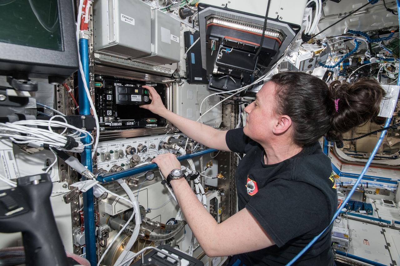 iss057e106250 (Nov. 27, 2018) --- NASA astronaut Serena Auñón-Chancellor mixes samples for the Microgravity Investigation of Cement Solidification (MICS) experiment and installs them into the Multi-use Variable-g Platform. The research utilizes the microgravity environment aboard the International Space Station to investigate the complex process of cement solidification. Results may impact possible construction processes and designs for space habitats on the surface of the Moon and Mars.