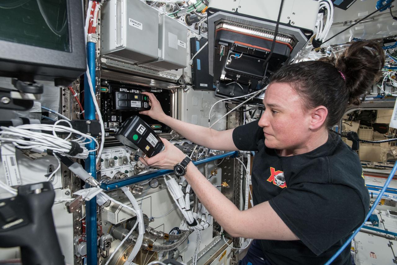iss057e106256 (Nov. 27, 2018) --- NASA astronaut Serena Auñón-Chancellor mixes samples for the Microgravity Investigation of Cement Solidification (MICS) experiment and installs them into the Multi-use Variable-g Platform. The research utilizes the microgravity environment aboard the International Space Station to investigate the complex process of cement solidification. Results may impact possible construction processes and designs for space habitats on the surface of the Moon and Mars.