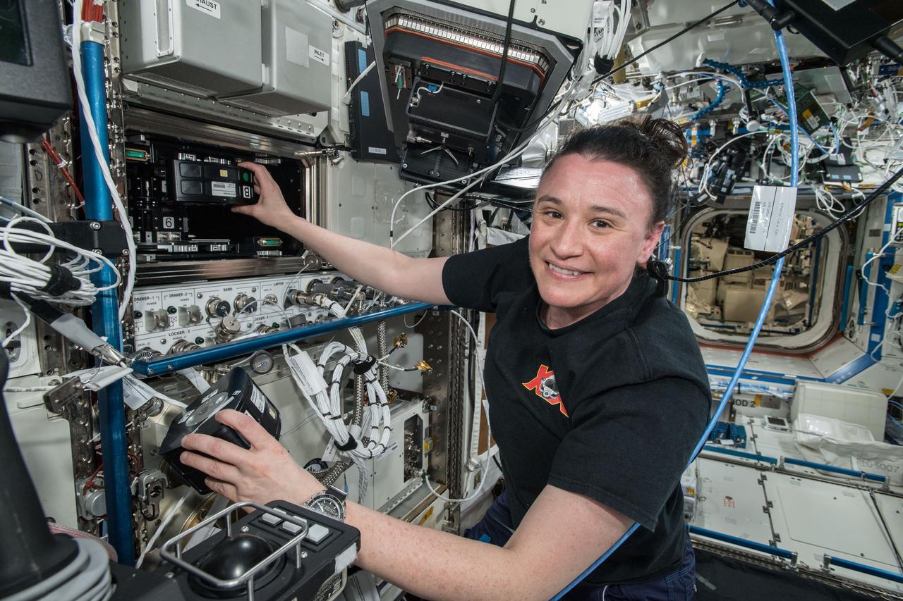 iss057e106264 (Nov. 27, 2018) --- Flight Engineer Serena Auñón-Chancellor mixes samples for the Microgravity Investigation of Cement Solidification (MICS) experiment and installs them into the Multi-use Variable-g Platform. The research utilizes the microgravity environment aboard the International Space Station to investigate the complex process of cement solidification. Results may impact possible construction processes and designs for space habitats on the surface of the Moon and Mars.