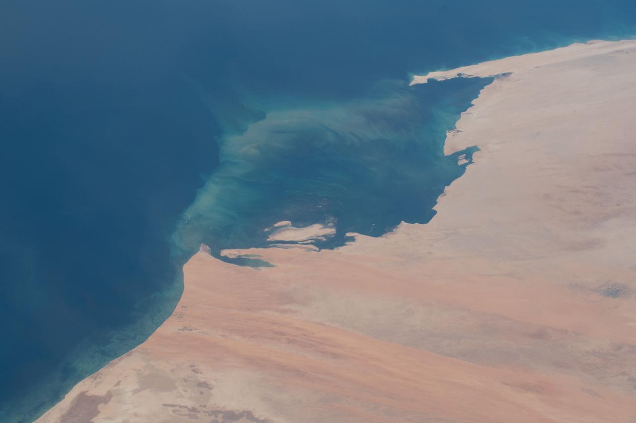 iss057e111398 (Dec. 4, 2018) --- An Expedition 57 crew member photographed the desert coast of Mauritania on the Atlantic Ocean near the border with Western Sahara on the African continent.