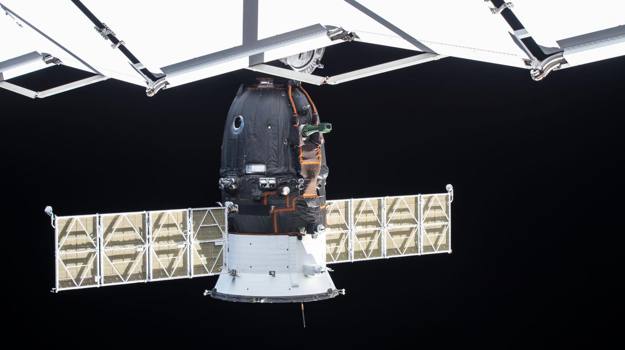 iss057e114163 (Dec. 7, 2018) --- The Soyuz MS-11 spacecraft docked to the Poisk module is pictured from a ground-controlled external high definition camera. The Soyuz crew ship arrived at the International Space Station Dec. 3 with three new crewmembers, including Soyuz Commander Oleg Kononenko and Flight Engineers Anne McClain and David Saint-Jacques. It will return the same three crewmembers to a parachute-assisted landing in Kazakhstan on June 24.