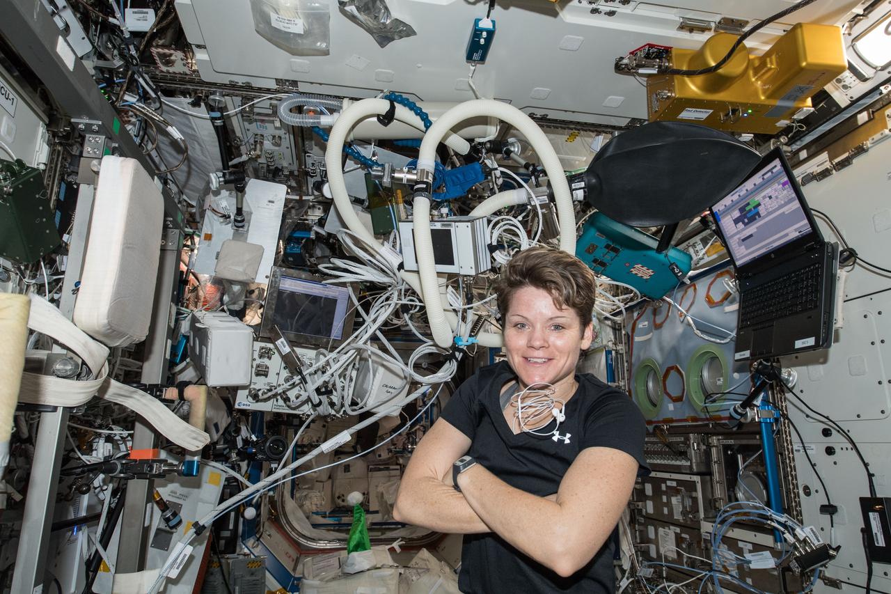 iss057e134112 (Dec. 14, 2018) --- NASA astronaut Anne McClain is inside the Destiny laboratory module surrounded by exercise gear, including laptop computers and sensors that measure physical exertion and aerobic capacity, during a workout session aboard the International Space Station.