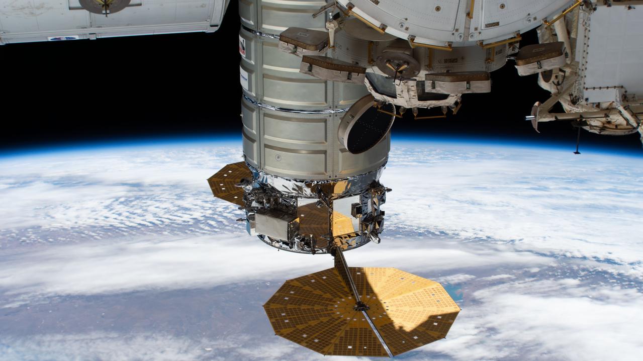 iss058e002244 (Jan. 7, 2019) --- The U.S. Cygnus space freighter from Northrop Grumman and its prominent cymbal-shaped UltraFlex solar arrays are pictured as the International Space Station orbited 262 miles above the Atlantic Ocean off the coast of Argentina. Towards the top center of the photograph is the seven-windowed cupola with its shutters open.