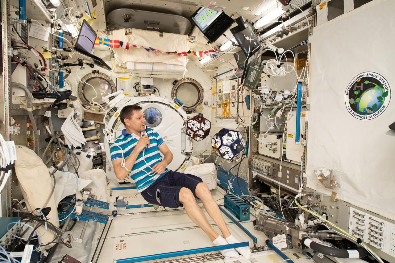 iss058e003128 (Jan. 14, 2019) --- Commander Oleg Kononenko works inside the Japanese Kibo lab module monitoring a pair of tiny internal free-flying satellites known as SPHERES (Synchronized Position Hold, Engage, Reorient, Experimental Satellites). High school students compete to design the best algorithms that control the basketball-sized satellites to mimic spacecraft maneuvers and formation flying.
