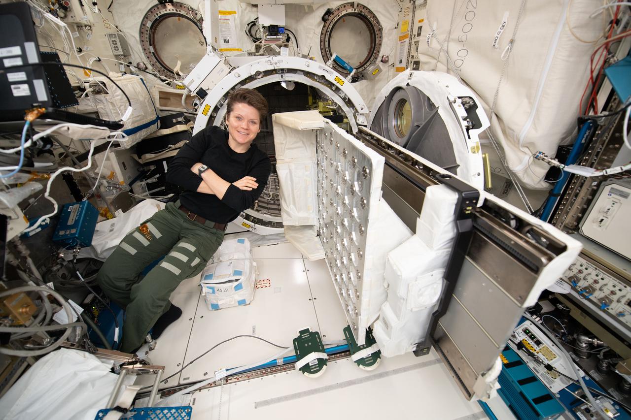 iss058e007370 (Jan. 29, 2019) --- NASA astronaut and Expedition 58 Flight Engineer Anne McClain works inside Japan's Kibo laboratory module. She was setting up and installing small satellite deployment hardware inside Kibo's airlock to eject a set of CubeSats outside the Japanese module.