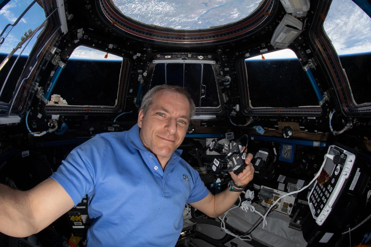 iss058e007457 (1/29/2019) --- Canadian Space Agency astronaut David Saint-Jacques is shown in the cupola onboard the International Space Station (ISS) with a camera assembly similar to that used by the Orion Optical Navigation System. The Optical Navigation (Optical Nav) investigation is a technology demonstration used to validate the backup navigation system for the Orion Multi-Purpose Crew Vehicle. Images of the Moon and adjacent star fields are being collected by these two cameras from the ISS cupola. The images are then analyzed on the ground using the same algorithms that will fly onboard Orion to determine vehicle position. These derived position measurements will be compared to the known position of the ISS at the moment each photo was taken. This will help validate the optical navigation performance using ISS as the test vehicle.