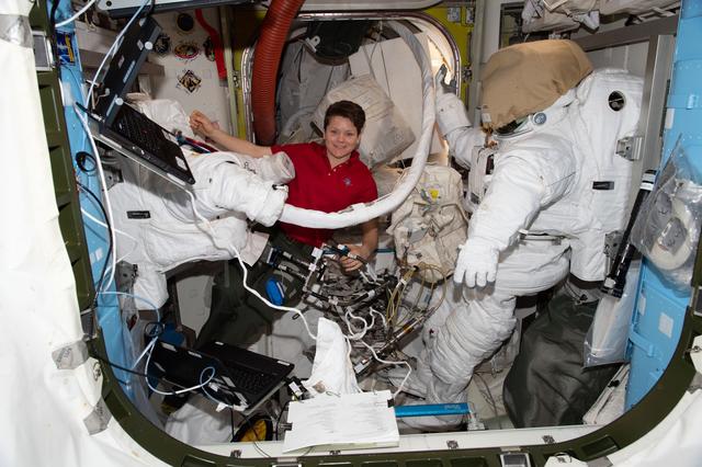 NASA image: NASA astronaut Anne McClain works inside the Quest joint airlock