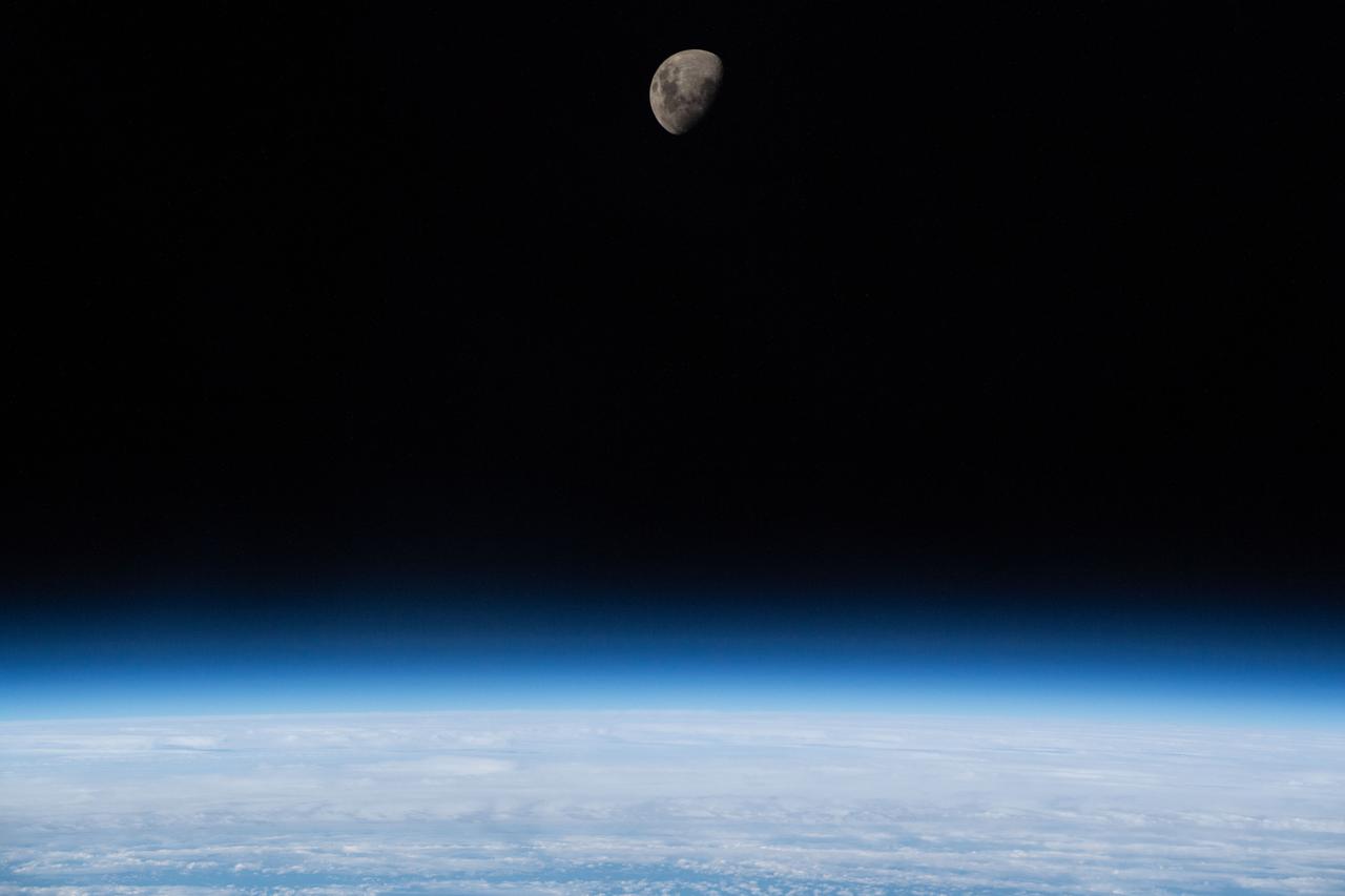 iss059e000461 (March 16, 2019) --- The waxing gibbous moon is pictured above Earth's limb as the International Space Station was orbiting 266 miles above the South Atlantic Ocean.
