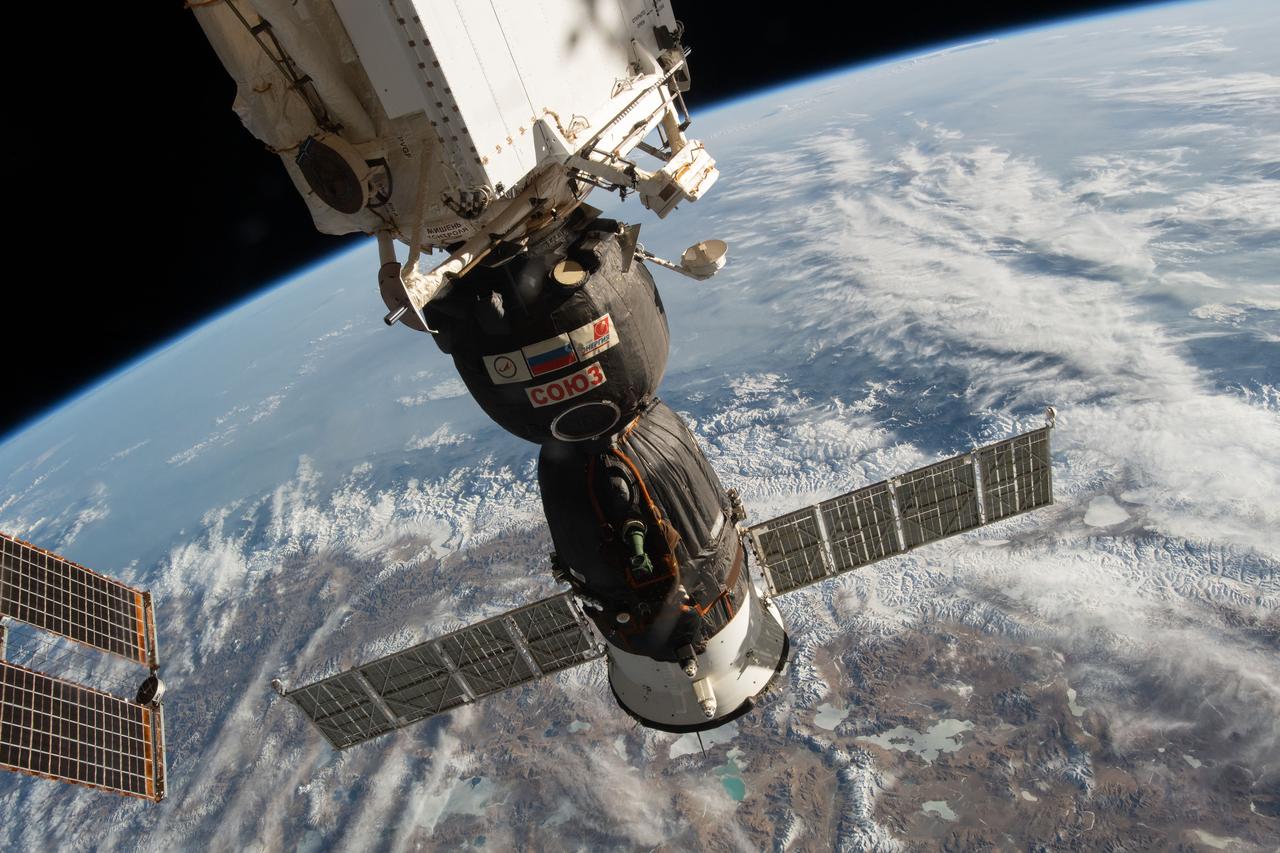 iss059e003532 (March 27, 2019) --- The Soyuz MS-12 crew ship is pictured docked to the Rassvet module as the International Space Station orbited 256 miles above India, Nepal and China.
