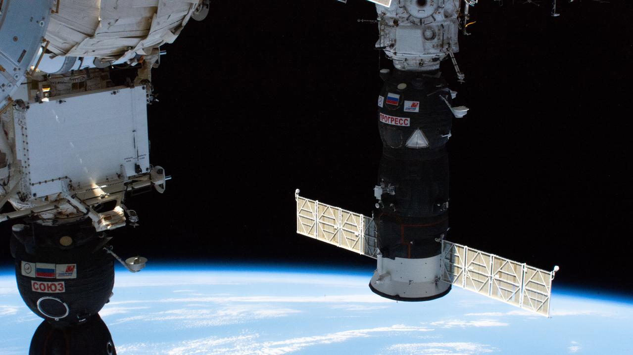 iss059e011764 (April 4, 2019) --- Russia's Progress 72 (72P) resupply ship is pictured docked to the International Space Station's Pirs docking compartment as the orbital complex flew 256 miles above the Atlantic Ocean. The 72P had launched from Kazakhstan a few hours earlier delivering 3.7 tons of food, fuel and supplies for the Expedition 59 crew. At bottom left is the Soyuz MS-12 crew spacecraft docked to the Rassvet module.
