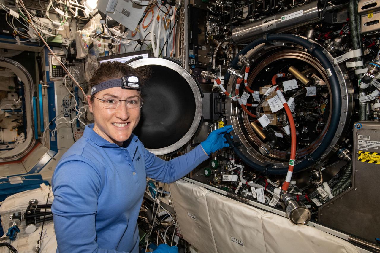 iss059e017127 (April 9, 2018) --- NASA astronaut and Expedition 59 Flight Engineer Christina Koch works inside the U.S. Destiny laboratory module's Combustion Integrated Rack. She was replacing hardware for a series of experiments collectively known as Advanced Combustion via Microgravity Experiments (ACME). ACME is a set of six independent studies researching improved fuel efficiency and reduced pollutant production in practical combustion on Earth, as well as spacecraft fire prevention through innovative research focused on materials flammability.