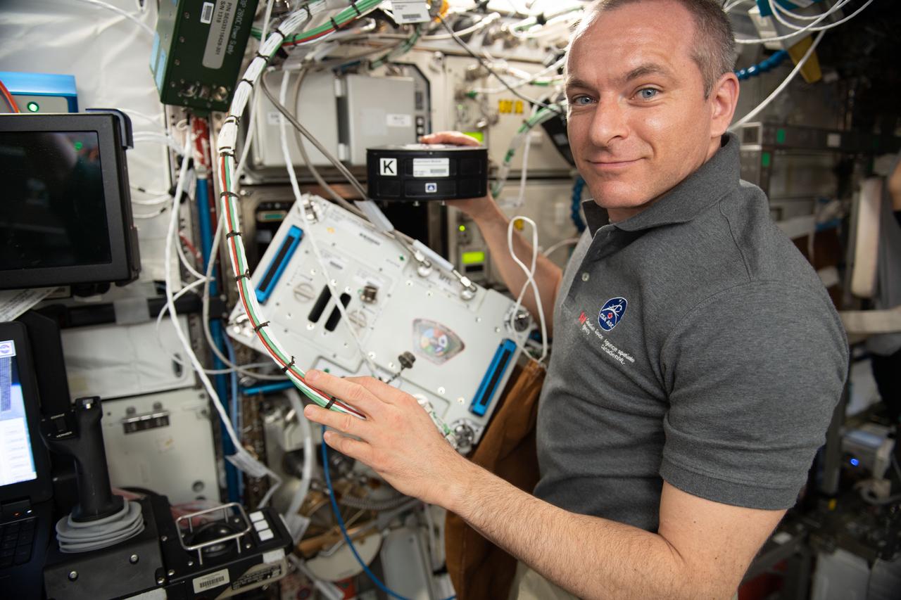 iss059e061366 (May 12, 2019) --- Canadian Space Agency astronaut David Saint-Jacques works with the Multi-purpose Variable-G Platform hardware exploring therapies for bone injuries and bone diseases on Earth and in space.