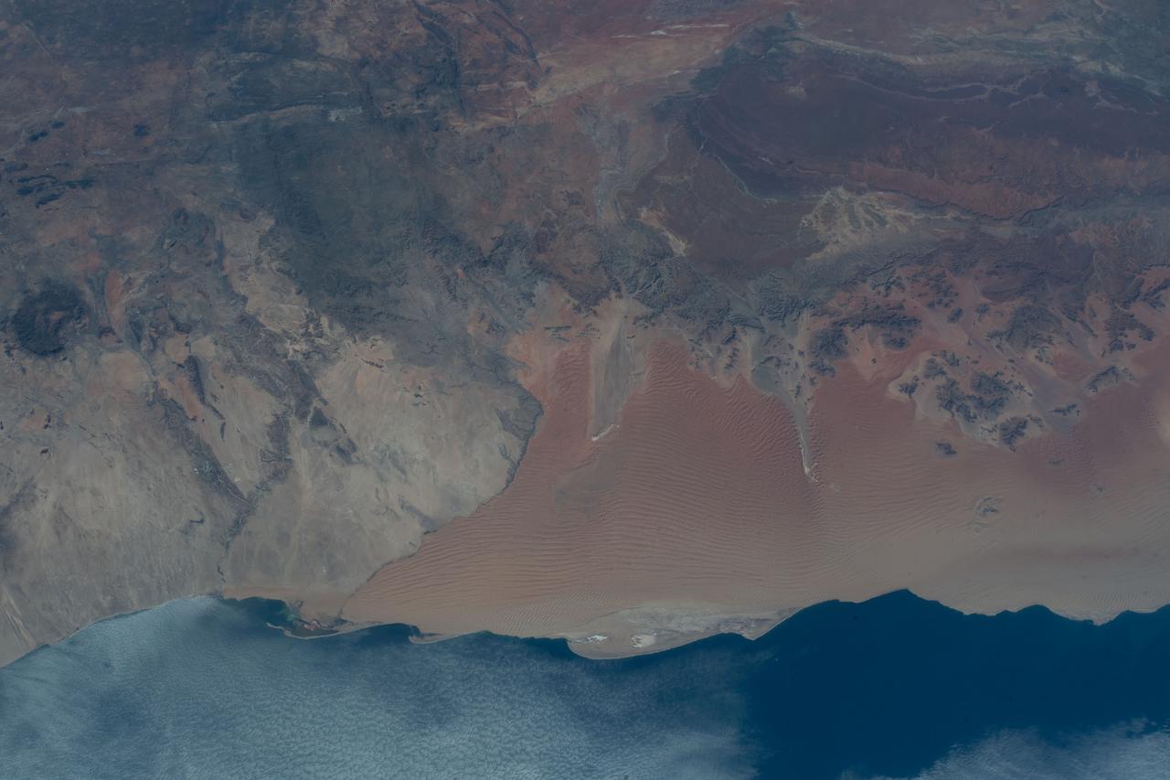 iss059e061447 (May 13, 2019) --- The Namib Desert on the Atlantic Coast of Namibia is photographed from an altitude of 259 miles as the International Space Station orbited off the coast of the southwestern Africa nation.
