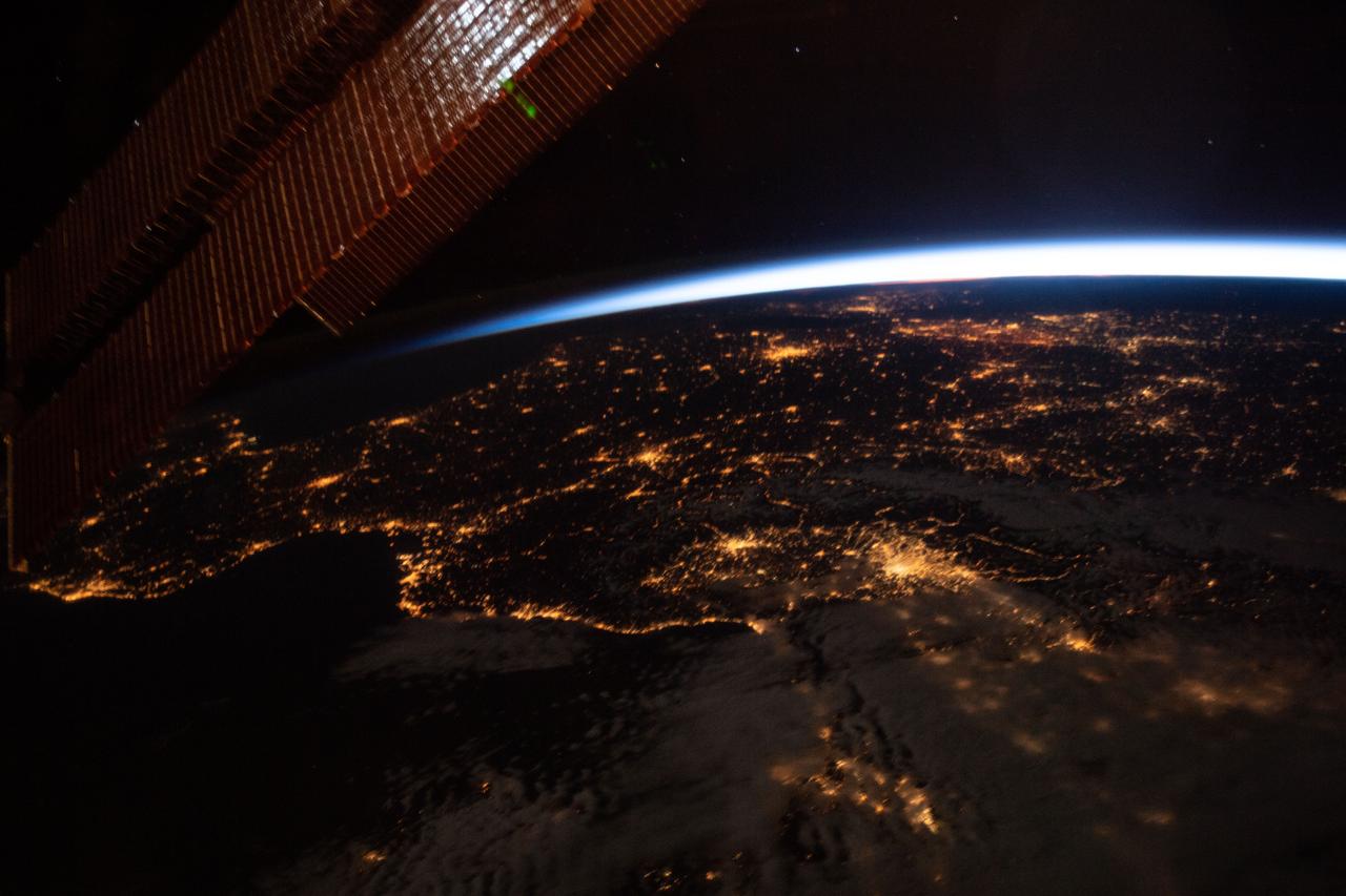 iss059e061476 (May 13, 2019) --- This oblique nighttime view of Western Europe and the well-lit coasts (from left) of Spain, France and Italy was taken from the International Space Station as it orbited 256 miles above the Mediterranean Sea.
